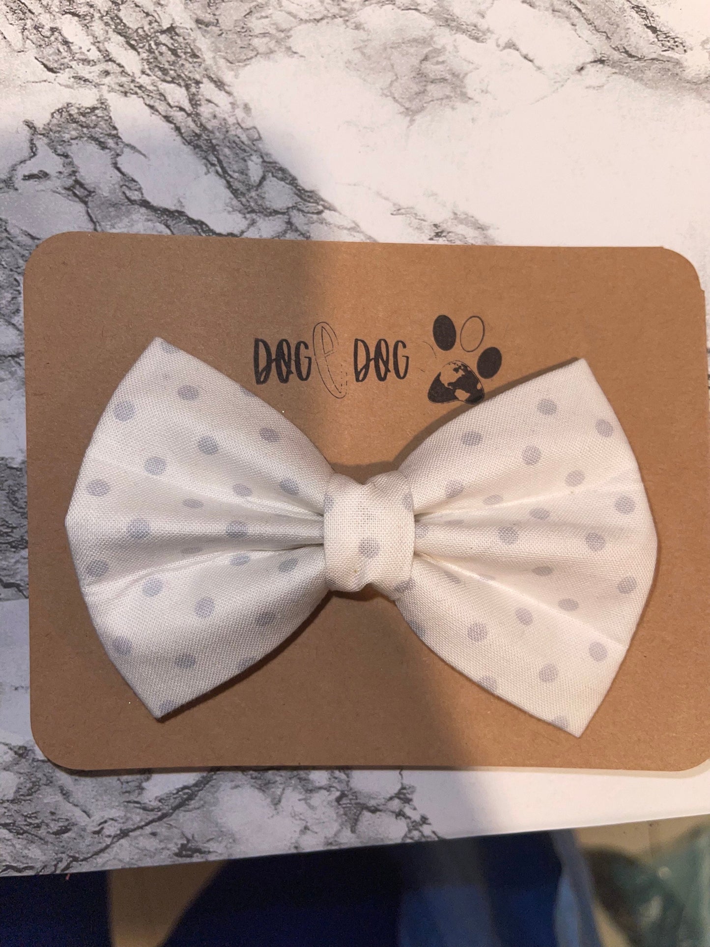 White with gray polka dots
