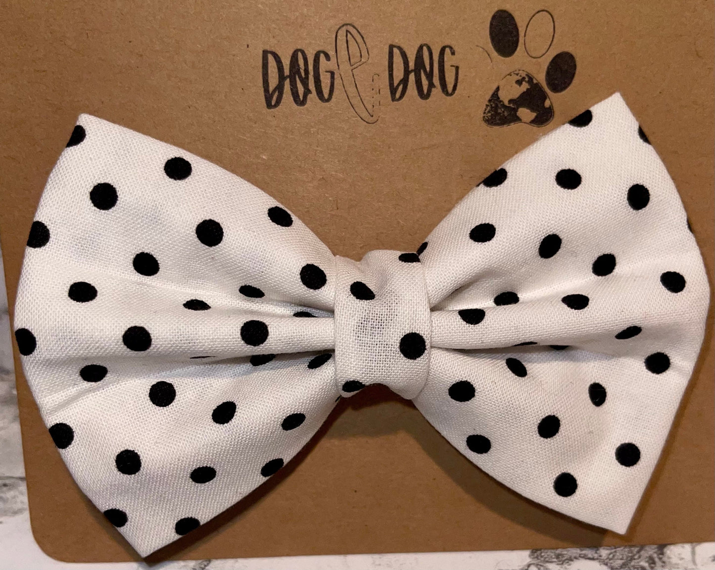 White with black polka dots