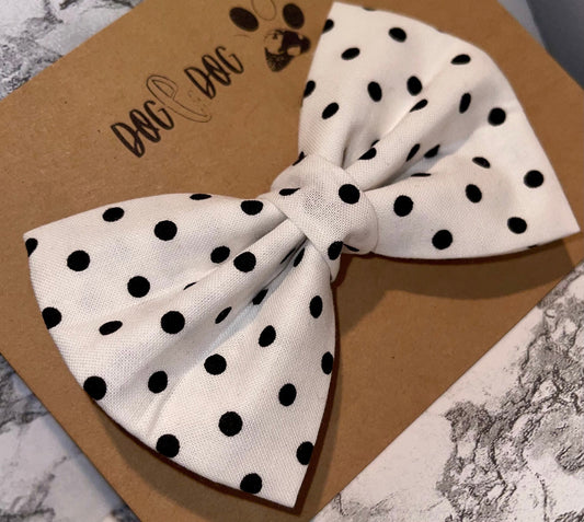 White with black polka dots
