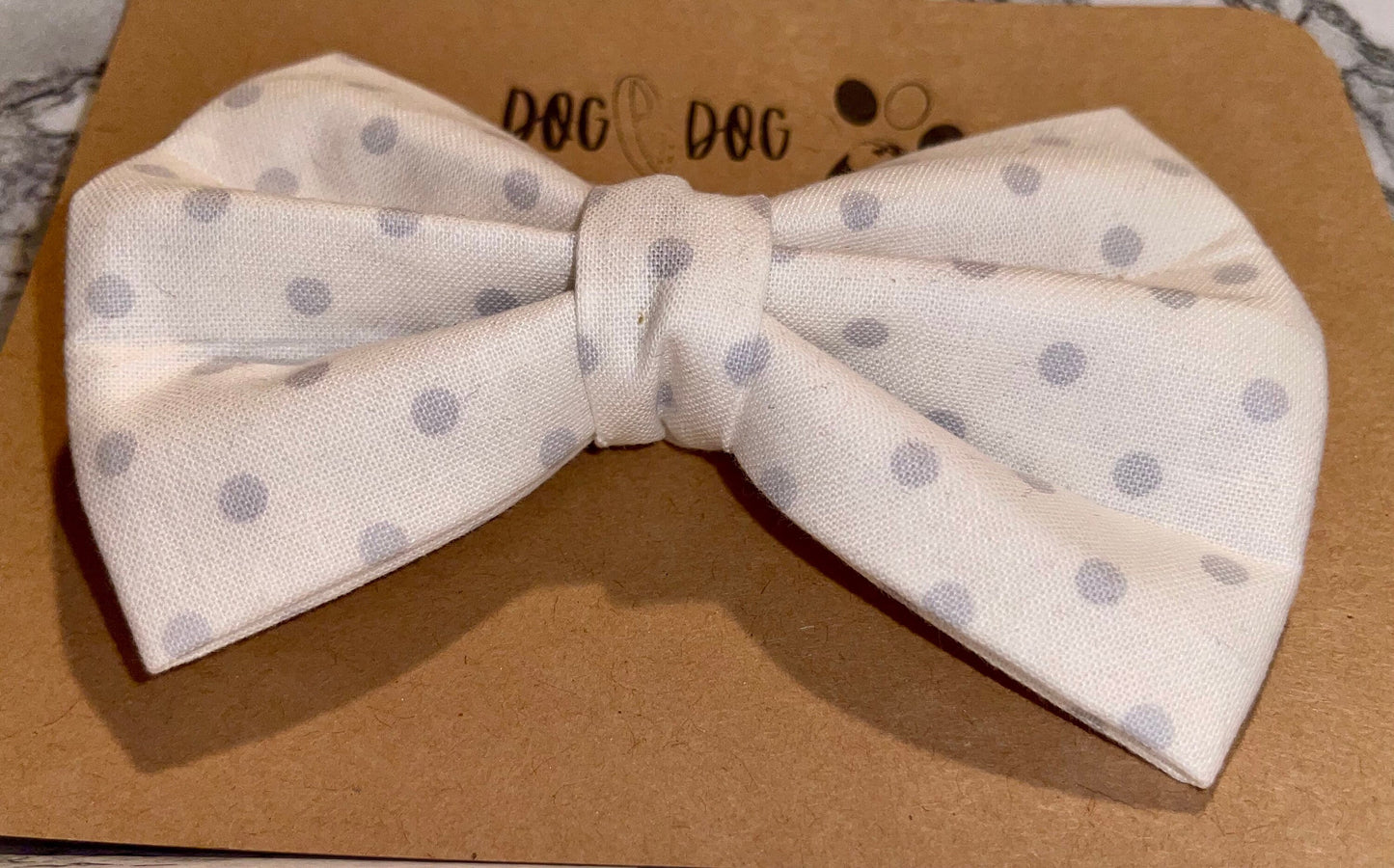 White with gray polka dots