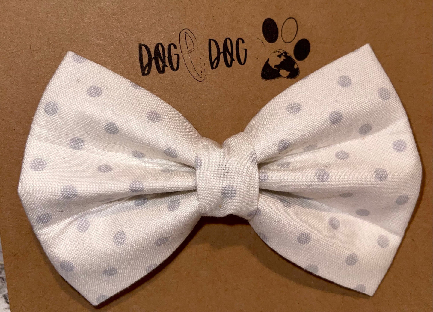 White with gray polka dots