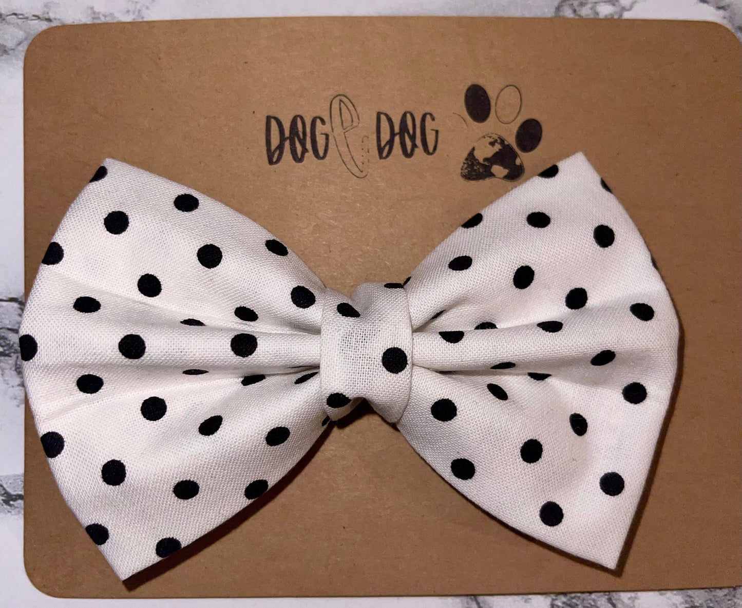 White with black polka dots