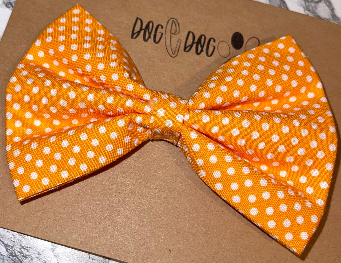 Orange with white polka dots